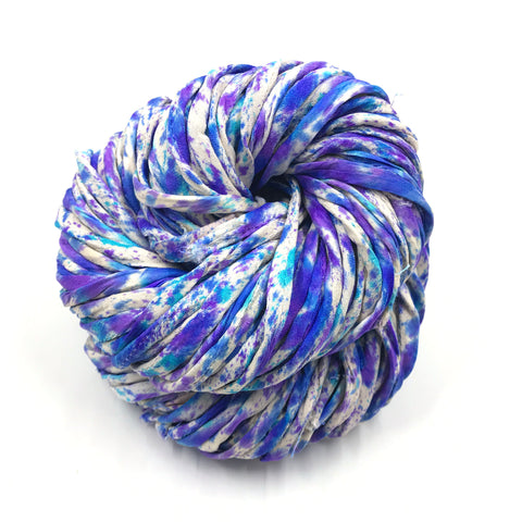 Recycled Sari Silk Piping Cord
- My Husband Did The Laundry, the cording has a white base with blue, sky blue, and purple speckles.