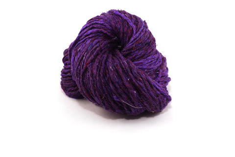 Speckled Tweed Recycled Silk Yarn
- Royal Purple, a deep dark purple yarn.