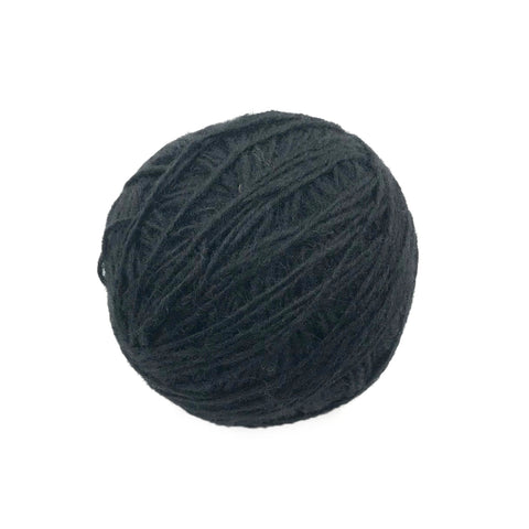 Yak Wool Yarn from Nepal- Black, a ball of black wool yarn.