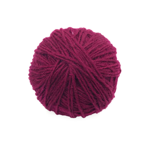 Yak Wool Yarn from Nepal- Mulberry, a deep berry pink ball of wool yarn.