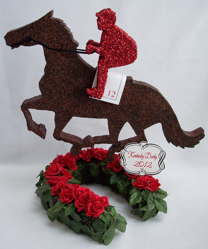 Kentucky Derby themed centerpieces with horse, jockey, trophy & roses