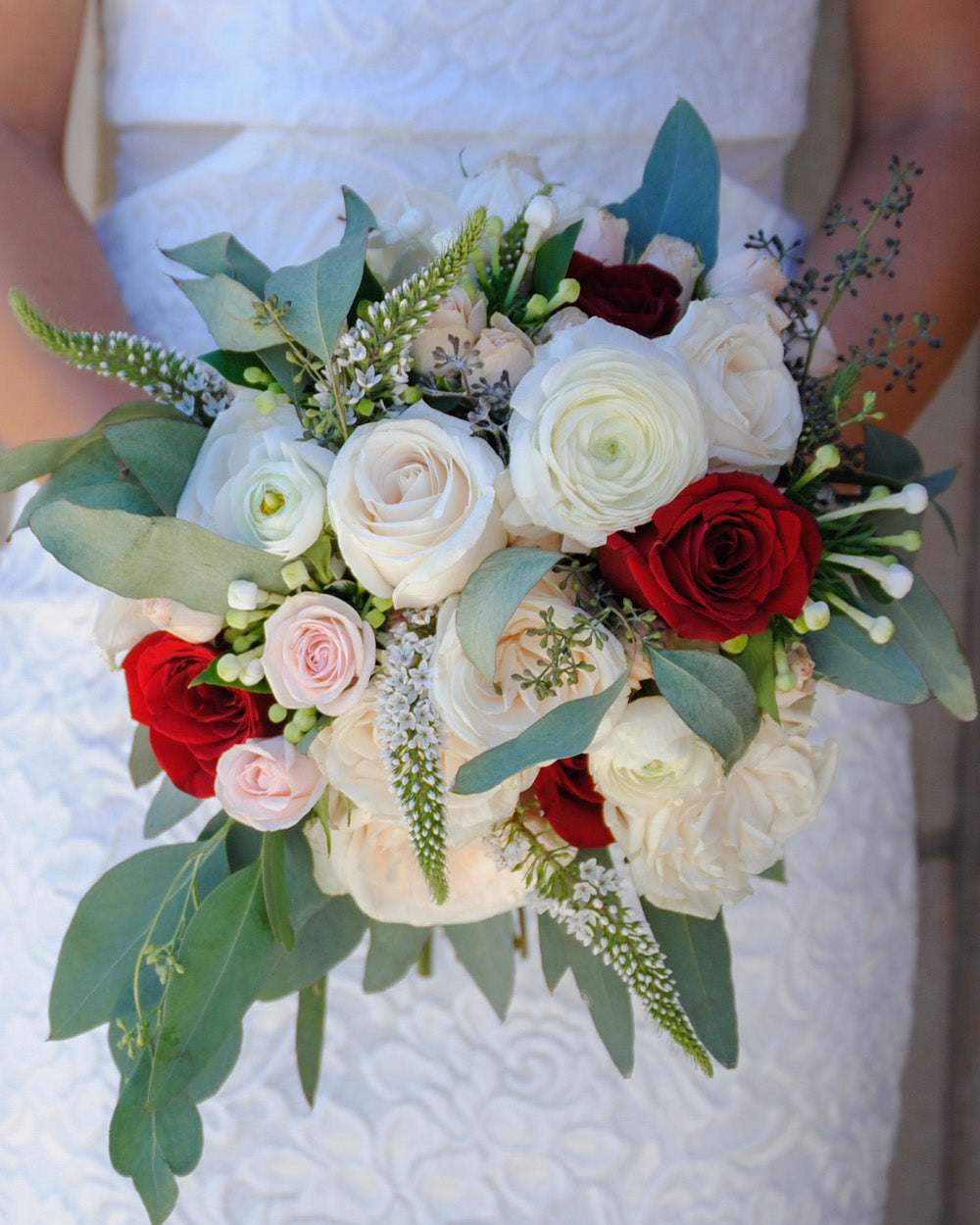 white and red bridal bouquet
