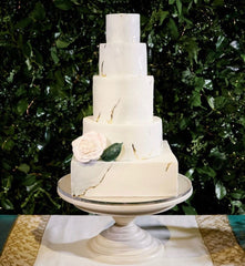 Marbled cake design with grey and Calcutta gold