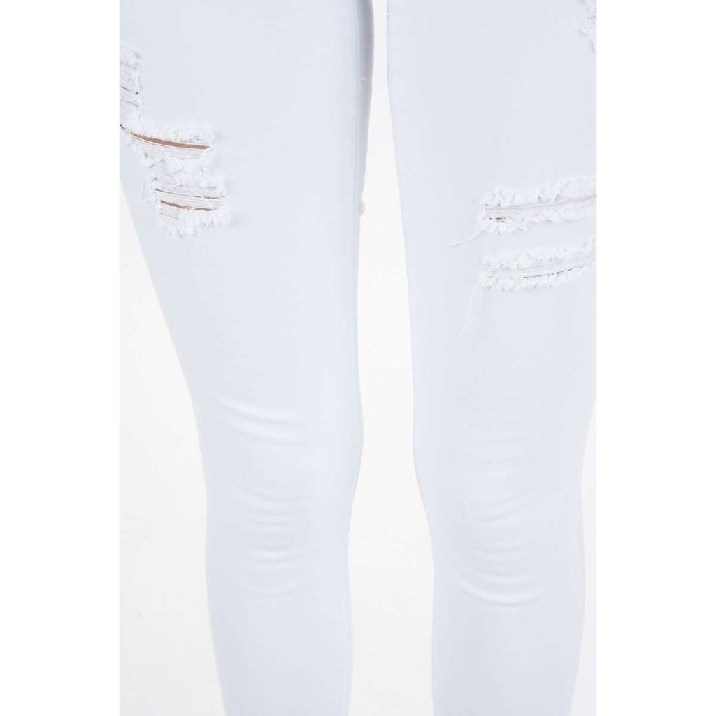 white distressed capris