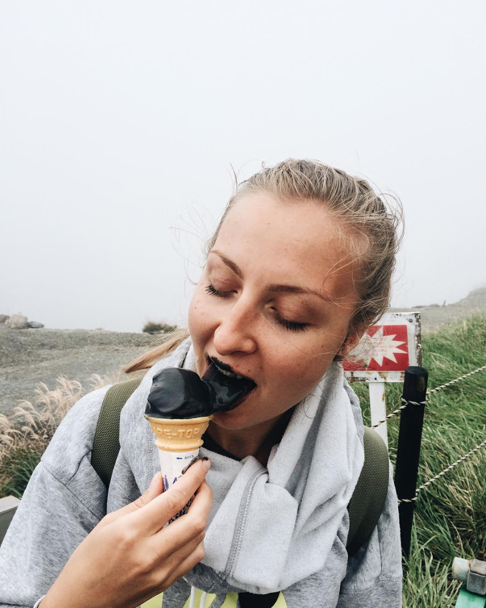 Dove eating Charcoal ice-cream in Japan.