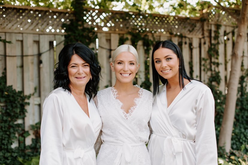 ontario bridal party getting-ready in white bridal robes from by catalfo