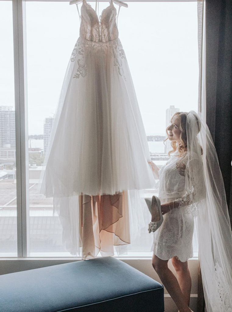 toronto bride wearing by catalfo bridal robe at the ritz-carlton