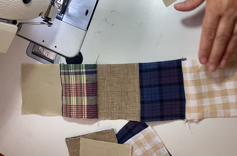 Linen Squares being sewn together.