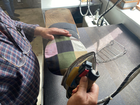 Vintage Cap Patchwork Linen being pressed.