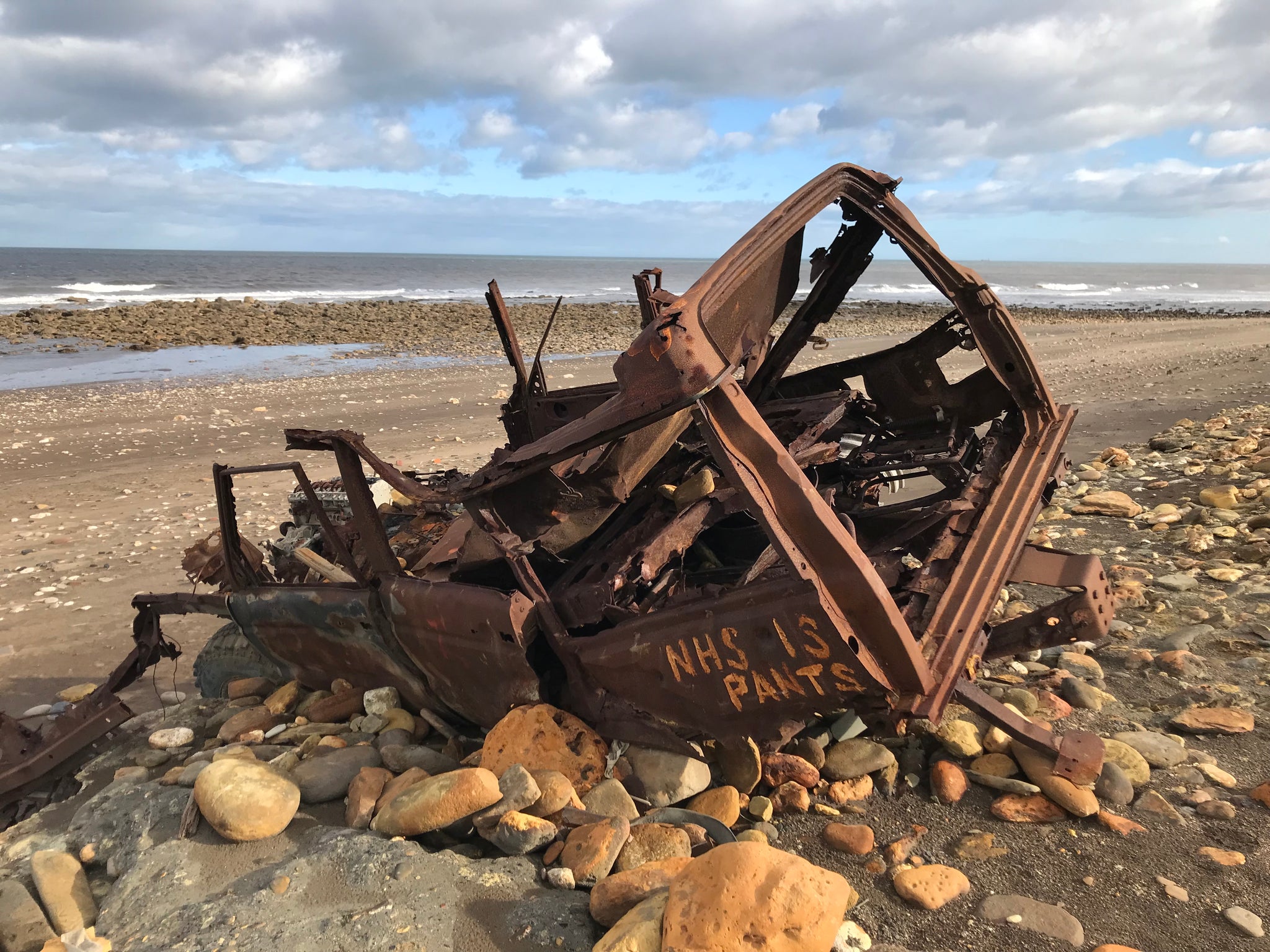 Landrover on Blackhall Rocks beach