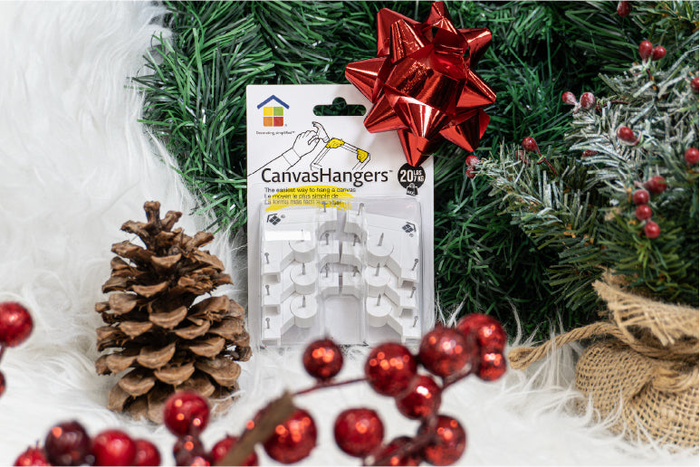 Image of CanvasHanger™ in package with Christmas decorations.