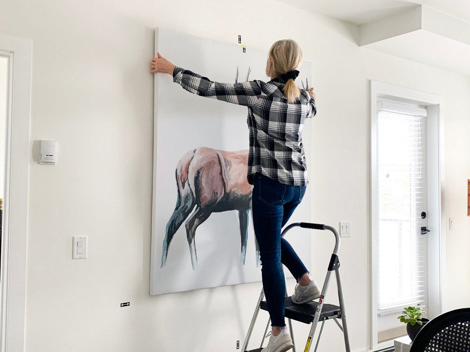 How to hang a large canvas - tools and tips