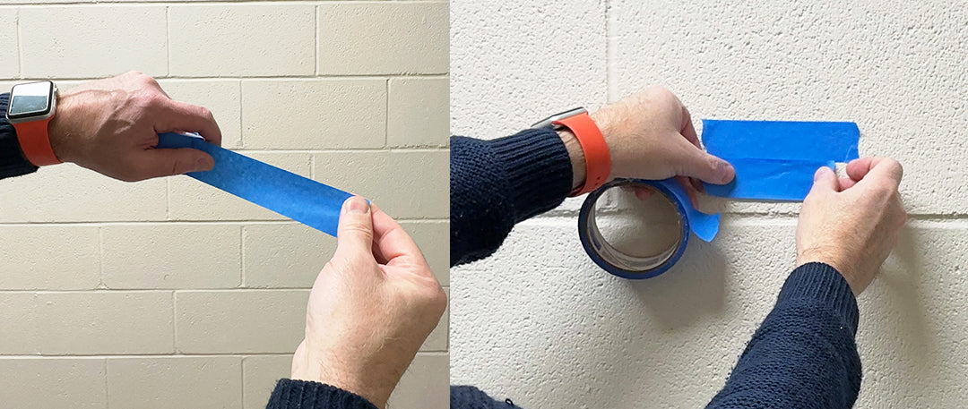 Two images: the first showing a person tearing off a piece of painter's tape; the second showing lightly adding painter's tape to the hardwall in the general area where the picture frame fastener will go