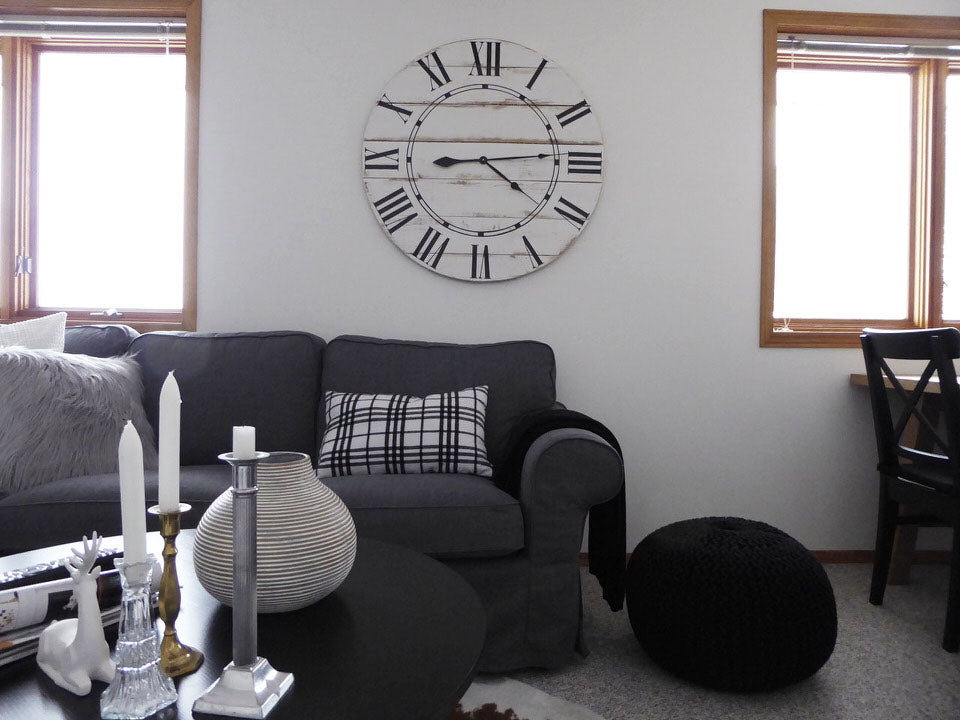 big clock hung in living room 