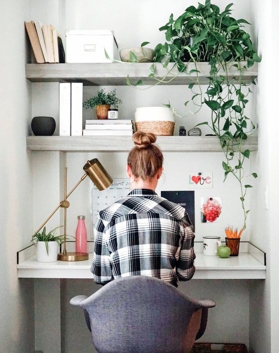 young girl sitting at a decorated desk