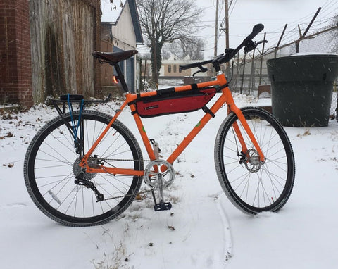 Jason's bike in inches of snow. Nothing will stop him!