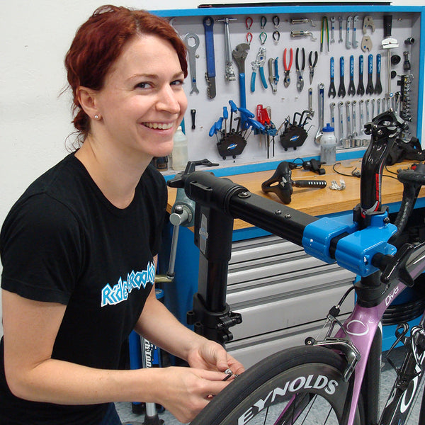 Jess working on a bike at Ride Brooklyn