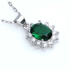 Oval lab-created Emerald Halo Pendant Necklace