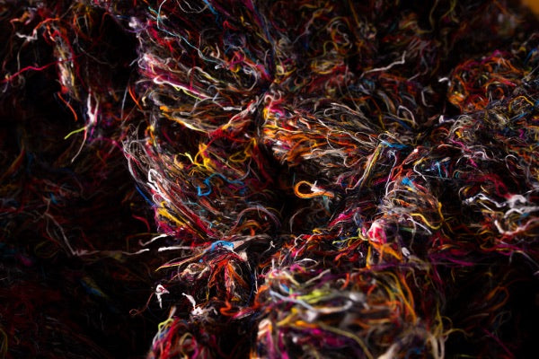 Pile of merino wool yarn fibers