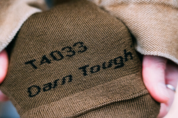 Closeup of the T4022 Darn Tough tactical sock, showing the Darn Tough knit into the toe