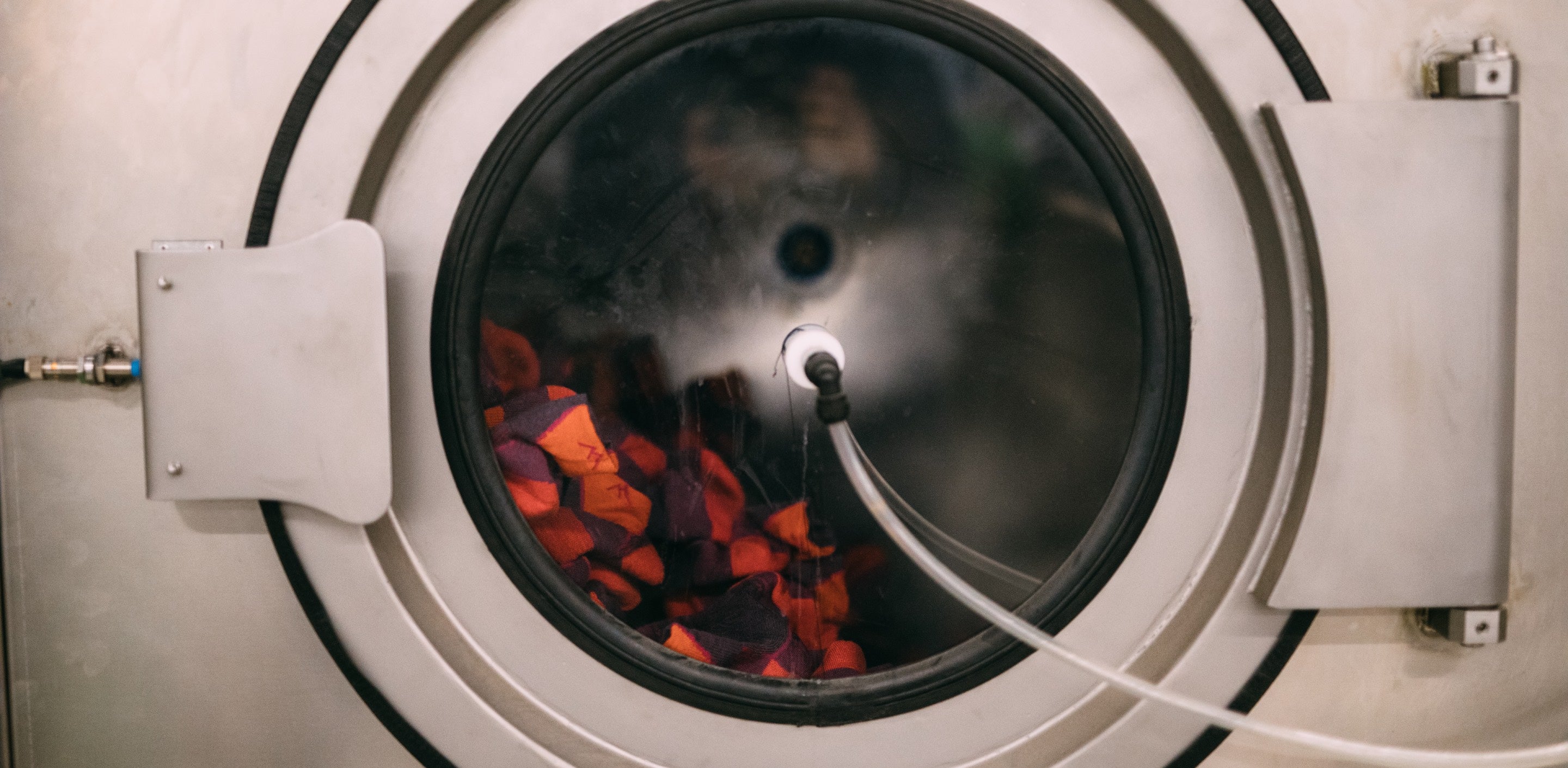 washing machine full of merino wool socks