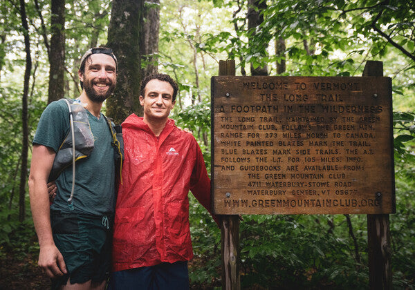 Ben and Owen at the Long Trail sign after finishing the FKT
