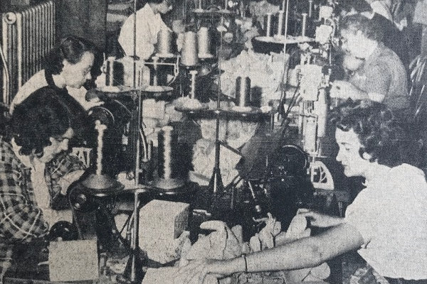 Black and white photo of Vermont Glove making gloves back in the 1900s