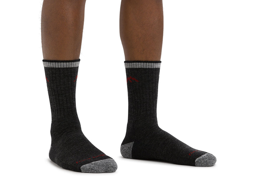 Feet wearing the Hiker Micro Crew socks in black