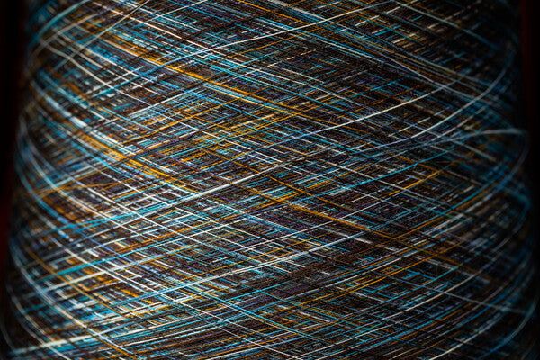 A closeup look at a skein of natural merino wool yarn