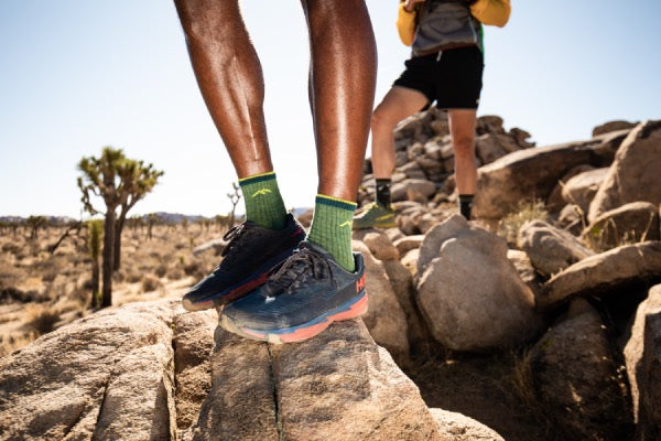 Man in merino wool hiking socks in hot weather