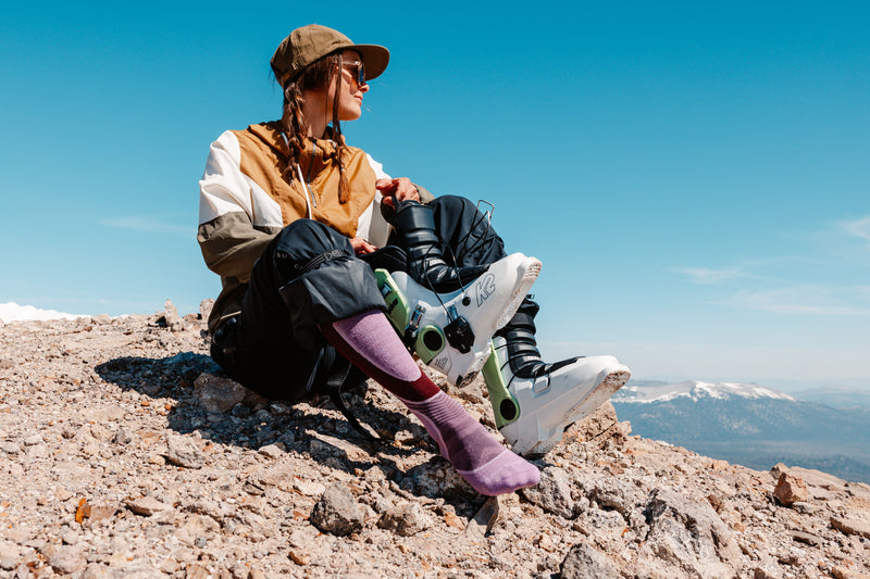 Skier in the backcountry wearing the Outer Limits ski socks from Darn Tough