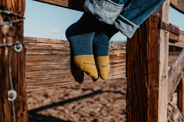 Feet wearing works socks with a full cushion toe box