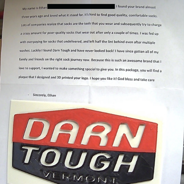 A letter from Ethan thanking Darn Tough for honoring the guarantee, with a 3D print of our logo