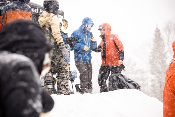 Pro snowboarder Jake Blauvelt chatting with the racers