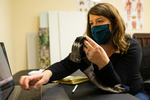 Brand and Community Manager Courtney working on the Jenerosity Sock to benefit Vermont Foodbank