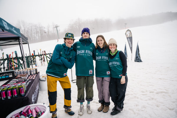 High Fives team members smiling for the camera