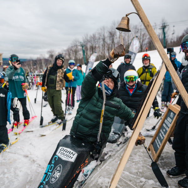 Sit ski boss Trevor Kennison ringing the bell