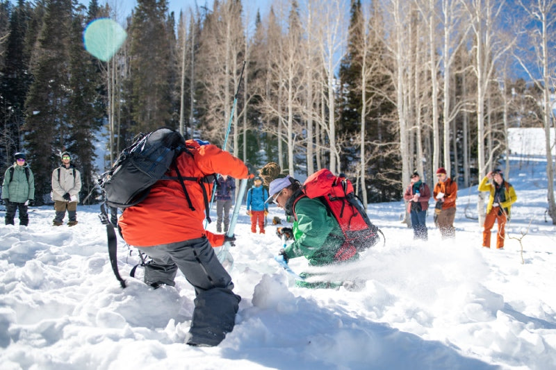 A group taking an avalanche safety course