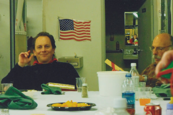 An old image of Ric and Marc Cabot sitting in the break room together