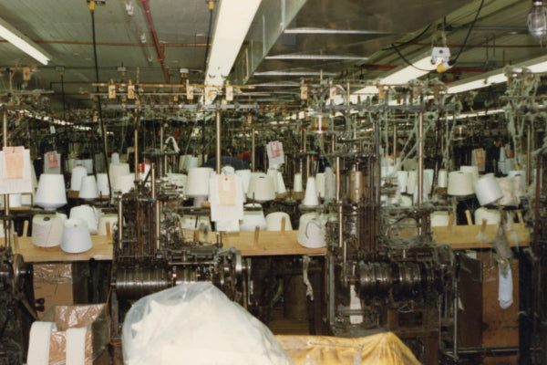 An old image of a sock mill making woolen socks