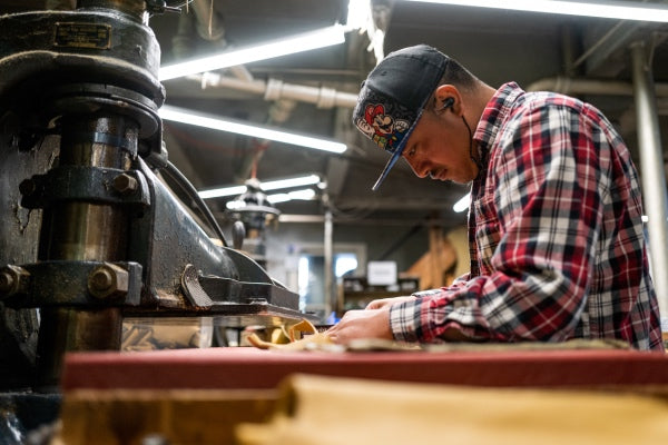 Vermont Glove employee working on making gloves