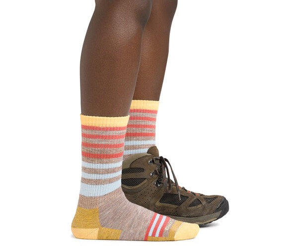 Example of darn tough boot socks on woman wearing them with hiking boots