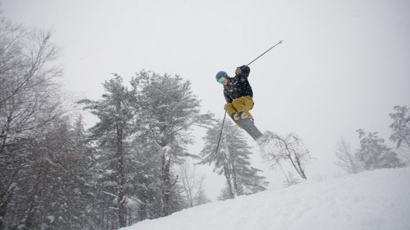 A skier jumping through the air