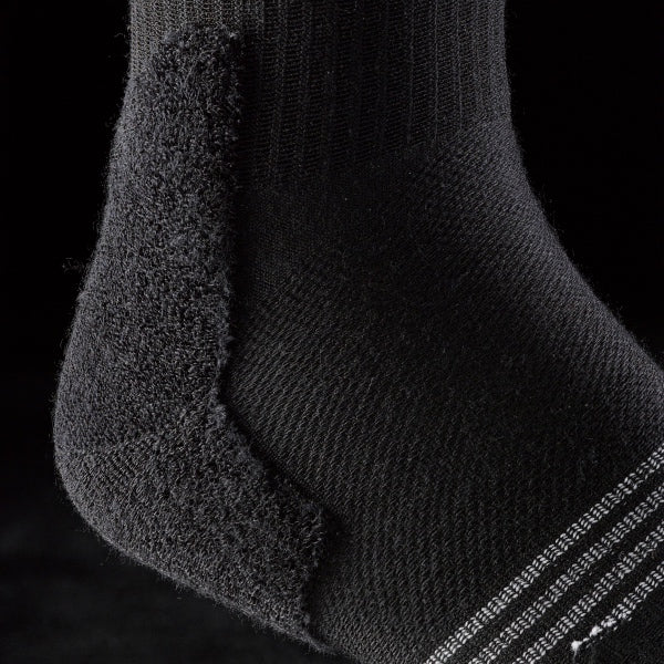 A look at the inside of a sock, showing the knit and Terry loop cushioning