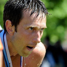 Close up of Josh Ferenc's face, covered in sweat after a race