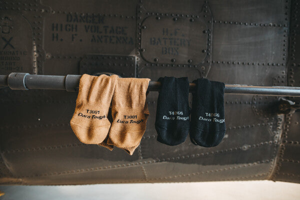 Two pairs of tactical socks hanging out to dry, the T3001 and T4066 military socks