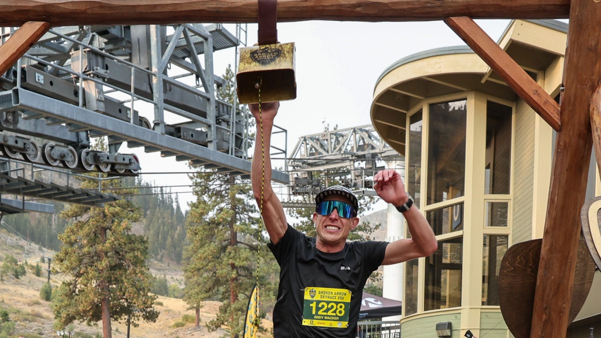 Andy Wacker ringing the cow bell at Broken Arrow Skyrace's finish line