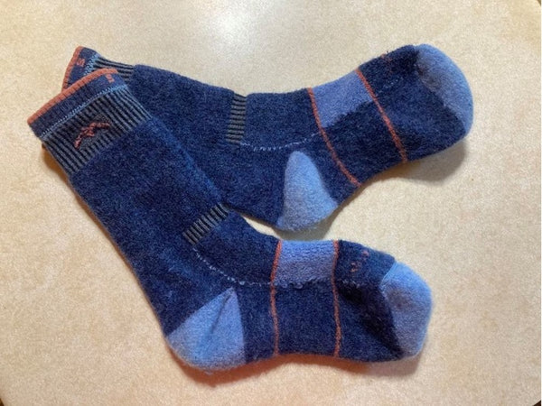 Turn merino wool socks inside out before placing in the washing machine
