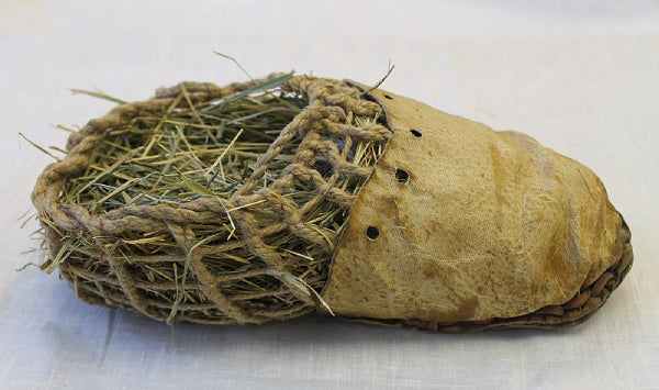 A replica of Otzi's shoe, including the grass "socks"
