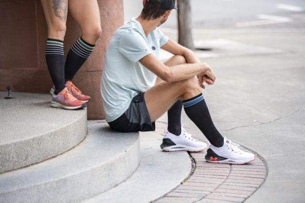 Josh wearing the Stride light compression running socks